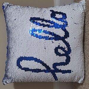 Reversible sequin pillow
